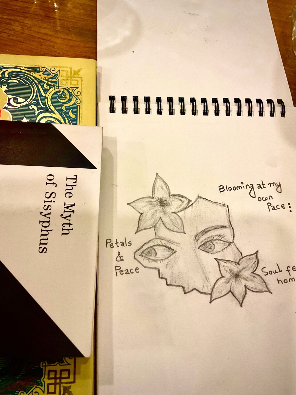 Drawing of a face with petals, captioned Blooming at my own pace