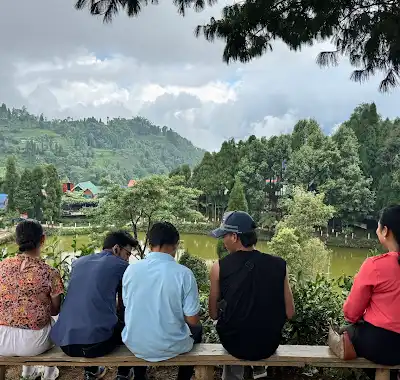 Team sitting on the hill