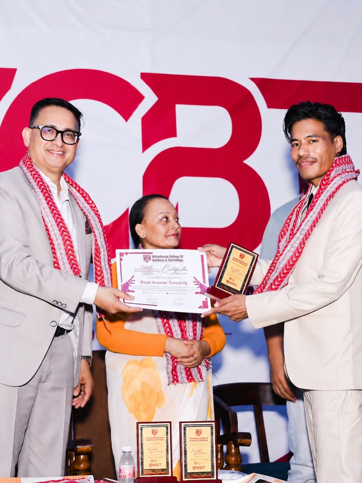 Ram receiving a token of love from the Mayor and HISSAN president, Jhapa
