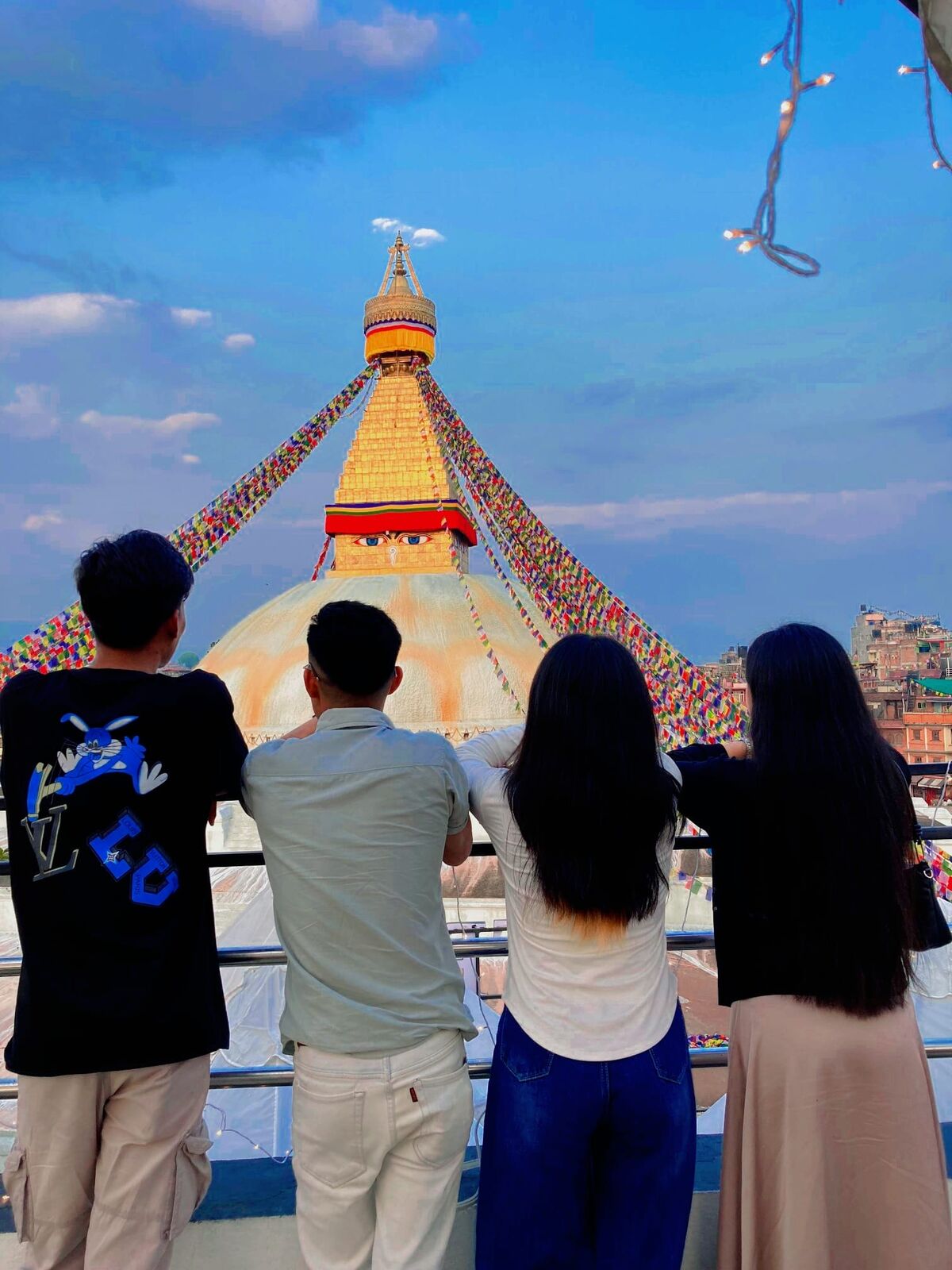 Friends looking out at Boudhanath stupa